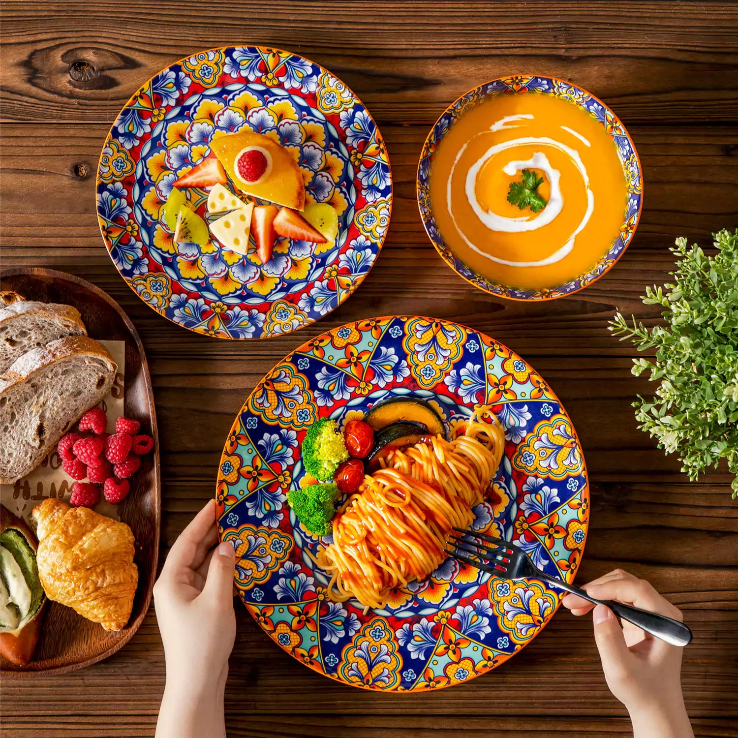 Bohemian-style 12-piece porcelain dinnerware set with front-only floral and geometric patterns in bold orange - modern and artistic table setting