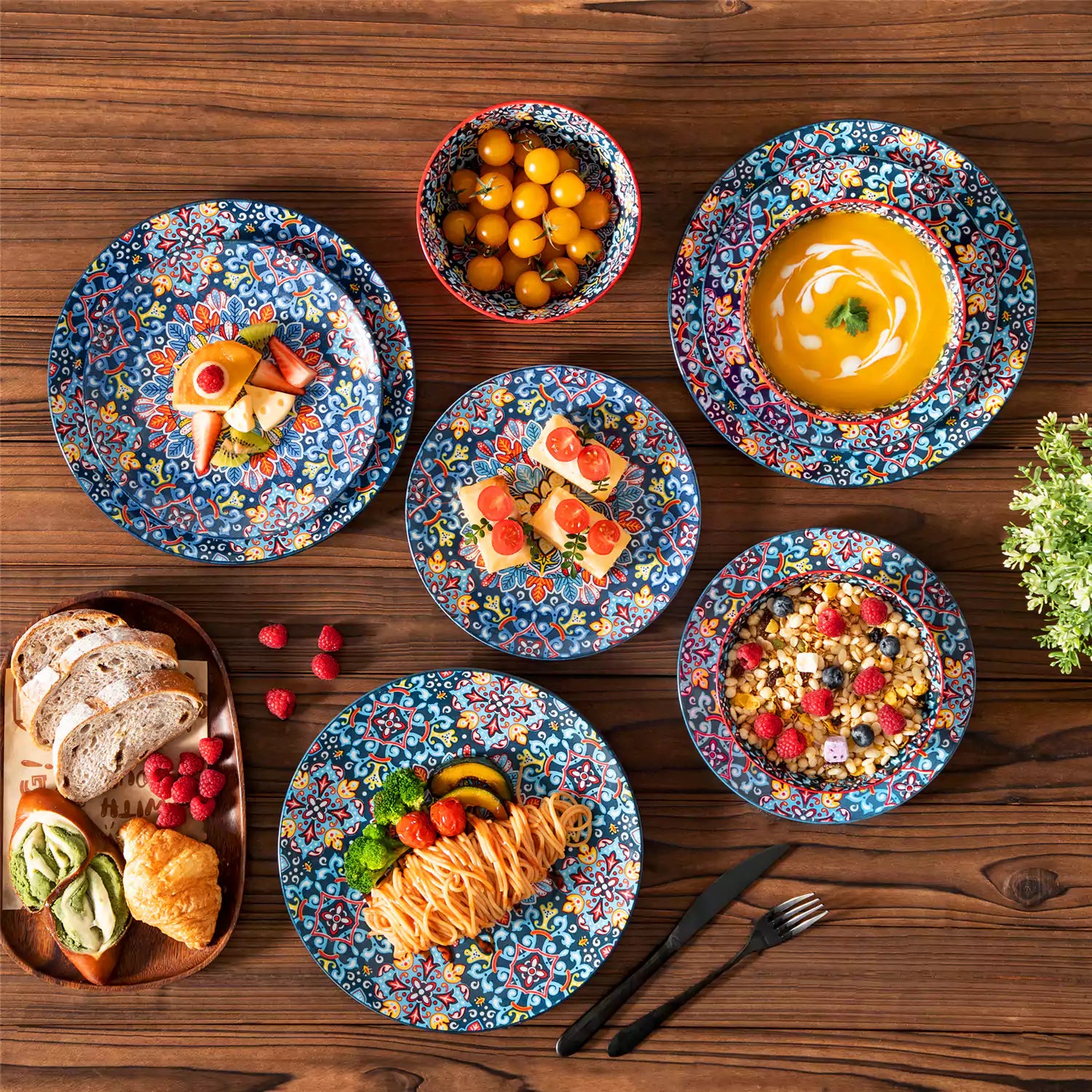 Bohemian-style 12-piece porcelain dinnerware set with front-only floral and geometric patterns in vivid red - modern and artistic table setting