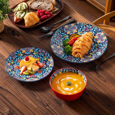 Bohemian-style 12-piece porcelain dinnerware set with front-only floral and geometric patterns in vivid red - modern and artistic table setting