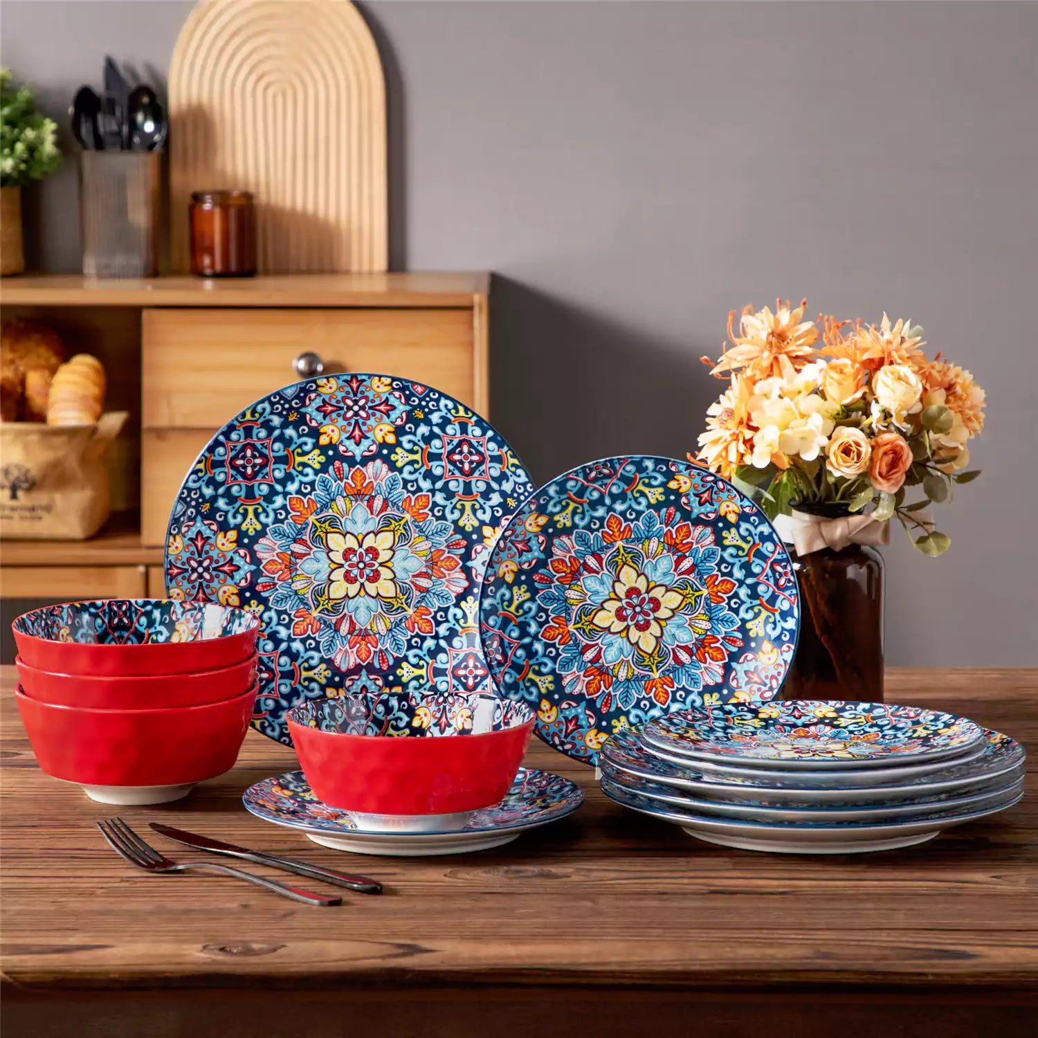 Bohemian-style 12-piece porcelain dinnerware set with front-only floral and geometric patterns in vivid red - modern and artistic table setting