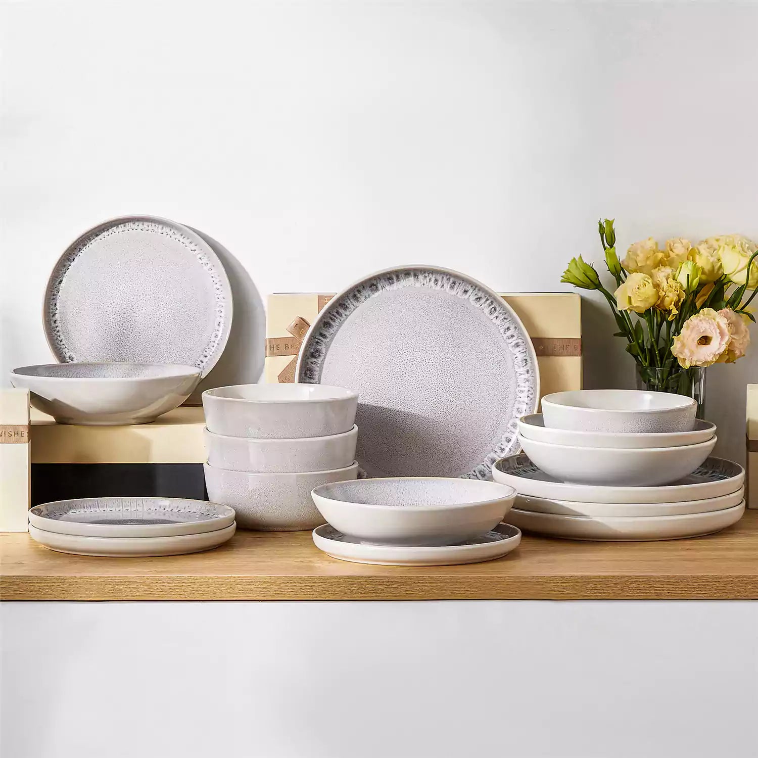 Snow 16-Piece Stoneware Set With Snowflake Glaze Perfect For Cozy Everyday Meals.