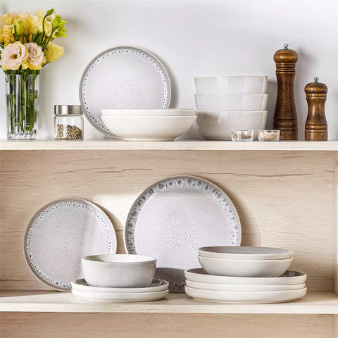 Snow 16-Piece Stoneware Set With Snowflake Glaze Perfect For Cozy Everyday Meals.