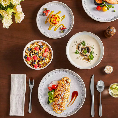 Snow 16-Piece Stoneware Set With Snowflake Glaze Perfect For Cozy Everyday Meals.