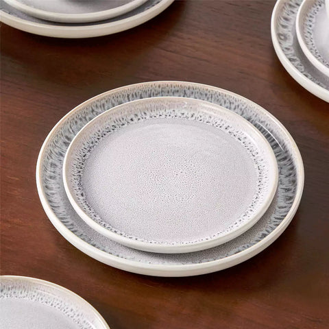 Snow 16-Piece Stoneware Set With Snowflake Glaze Perfect For Cozy Everyday Meals.