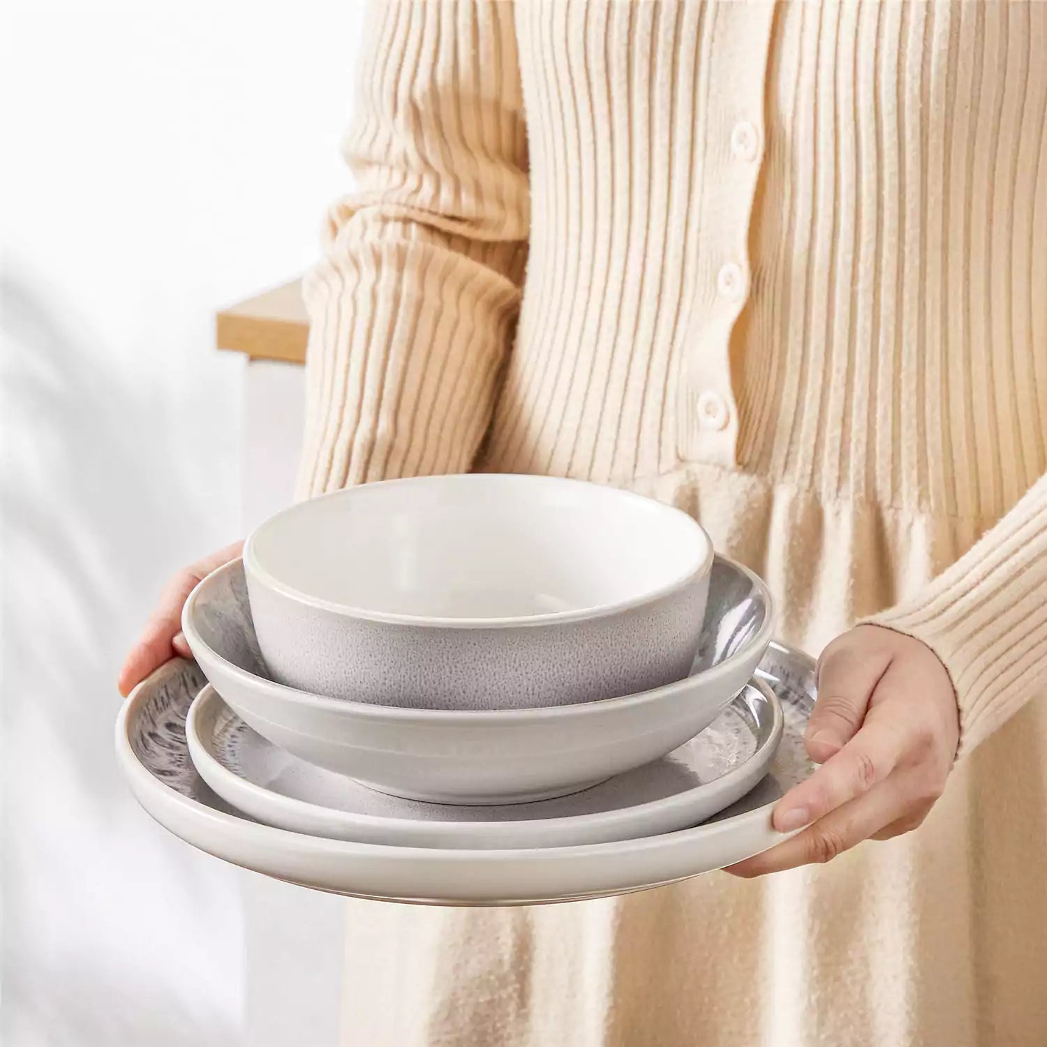 Snow 16-Piece Stoneware Set With Snowflake Glaze Perfect For Cozy Everyday Meals.