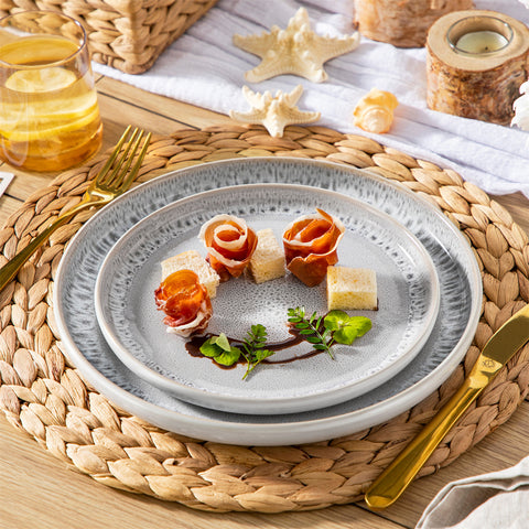 The Snow 18-Piece Dinnerware Set Includes Plates And Bowls To Create A Classic And Elegant Table Setting - Beige