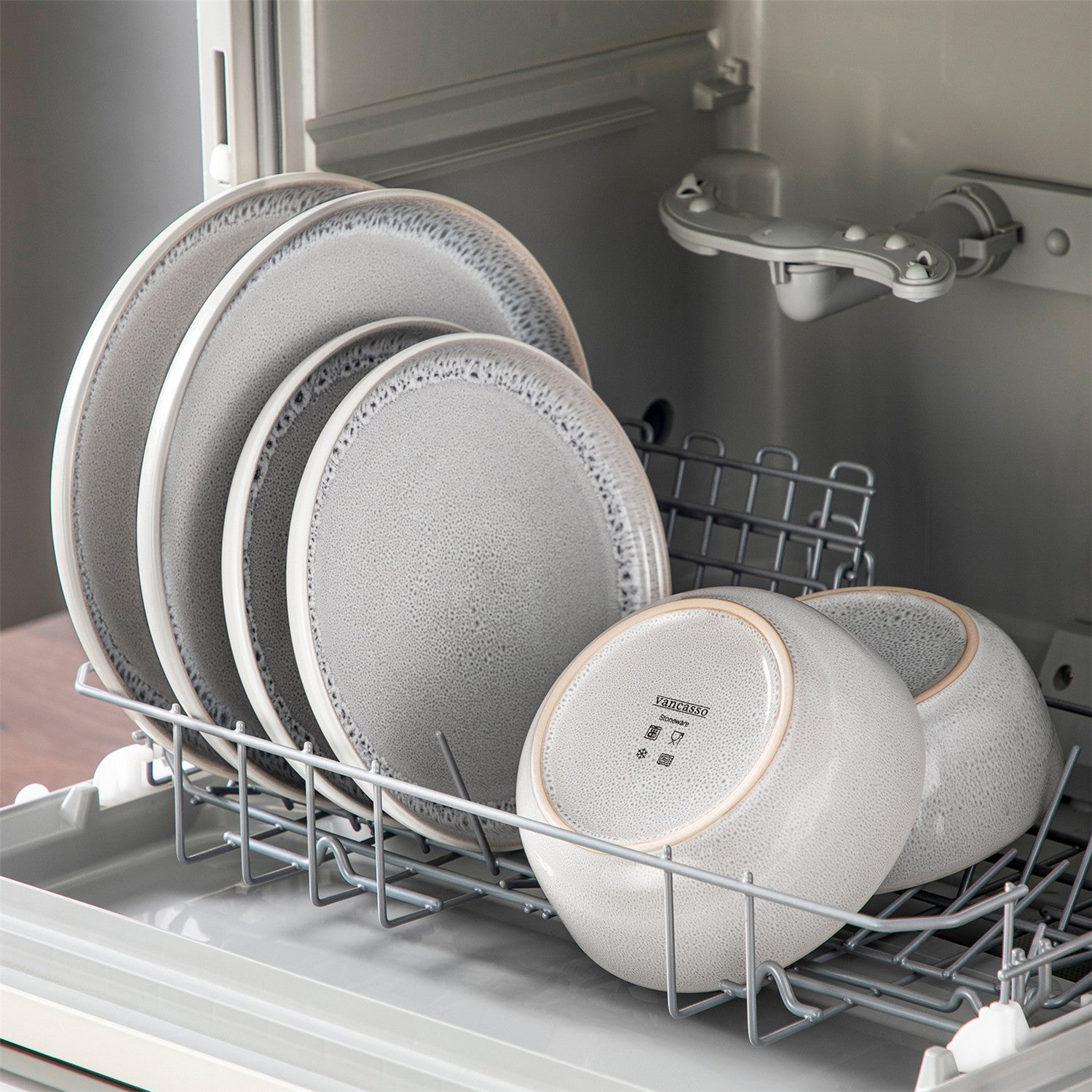 The Snow 18-Piece Dinnerware Set Includes Plates And Bowls To Create A Classic And Elegant Table Setting - Beige