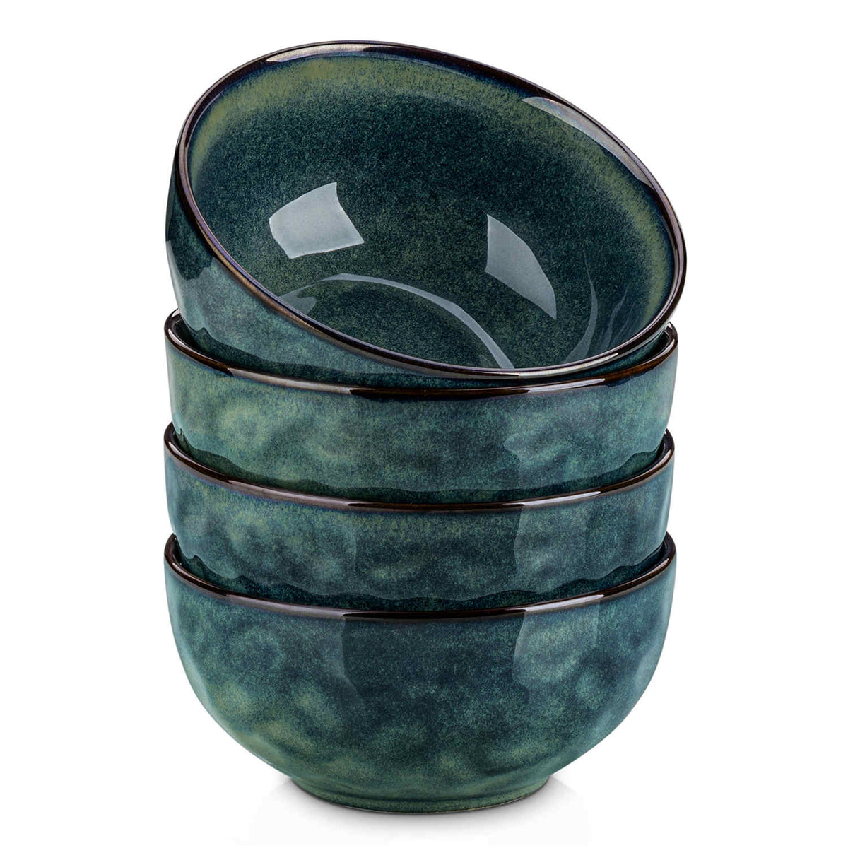 Starry reactive glaze cereal bowls in teal green on a rustic wooden table - filled with creamy soup - pasta - and fresh fruit salad for a cozy - celestial dining vibe