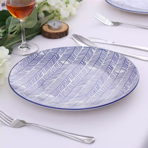 Porcelain dinner plates set of 4 with classic Japanese indigo stripe patterns, featuring assorted designs, ideal for serving steak.