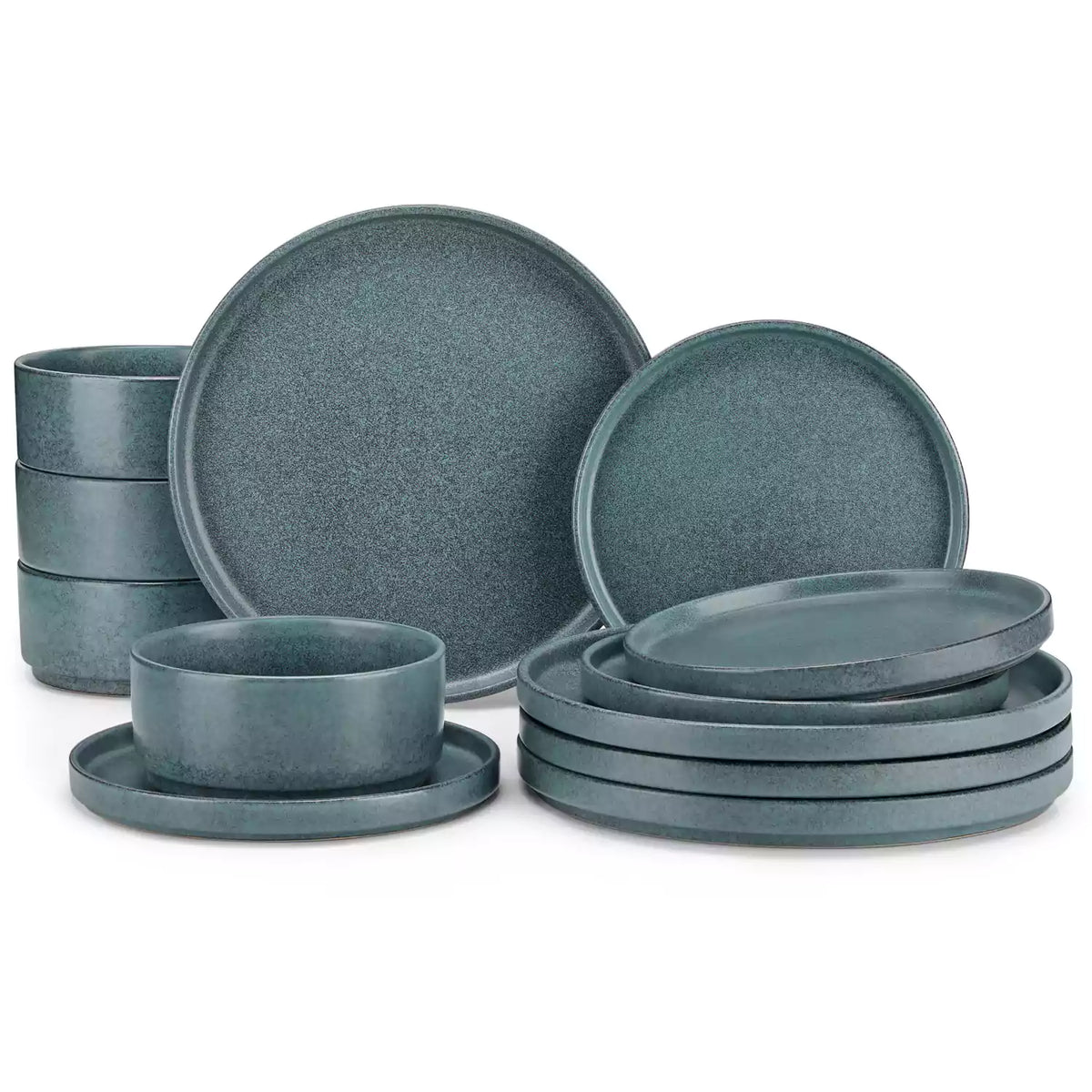 Blue reactive glaze stoneware dinner plates styled with food on rustic wood table with woven placemats modern minimalist tableware set