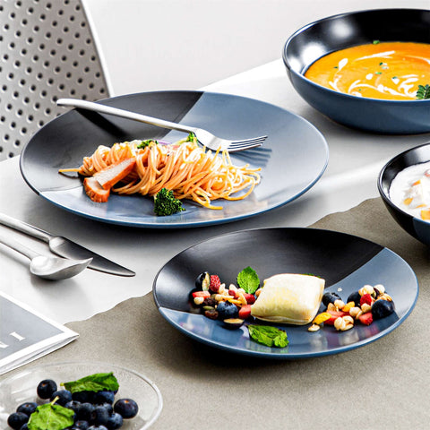 Accel 16-piece blue and black two-tone semi-matte dinnerware set with pasta plates and soup bowls