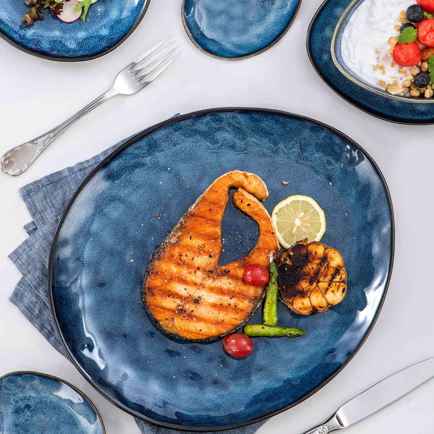 Starry 11-Piece Dinnerware Set with Oval Plates - Bowls - and Serving Dishes in Blue Reactive Glaze-vancasso